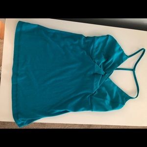 Lululemon size 8 turquoise tank top. Cross front!